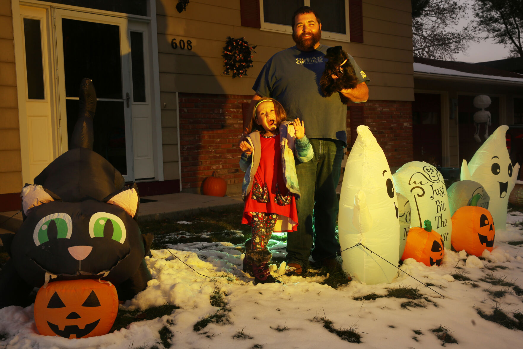 Lyvee Fox, 6, her dad Bob and their toy Toy Schnauzer puppy Ellie Mae are quite proud